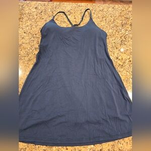Women's one piece workout dress. Built in bra, shorts w/pockets, XL